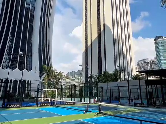 Pickleball and paddle courts with KL skyline
